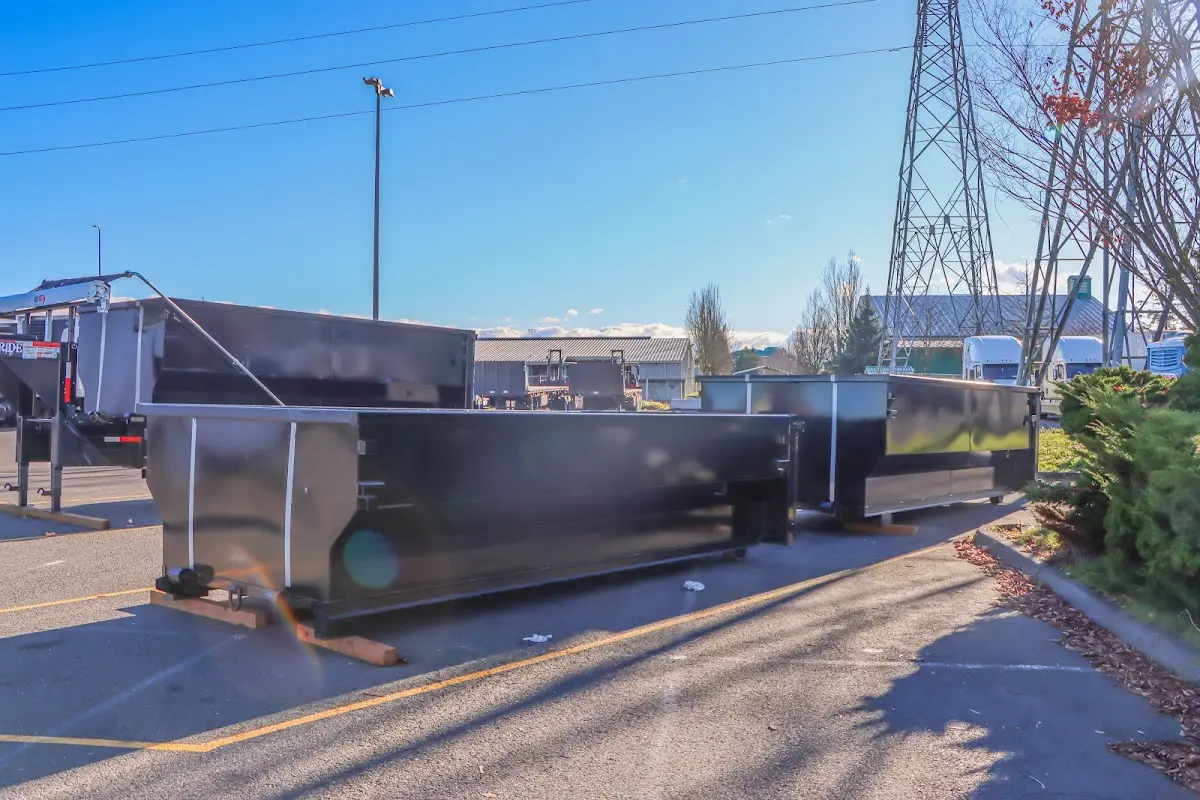 Roll-off dumpster ready for waste disposal at job site for Construction Dumpster Rental in Oviedo